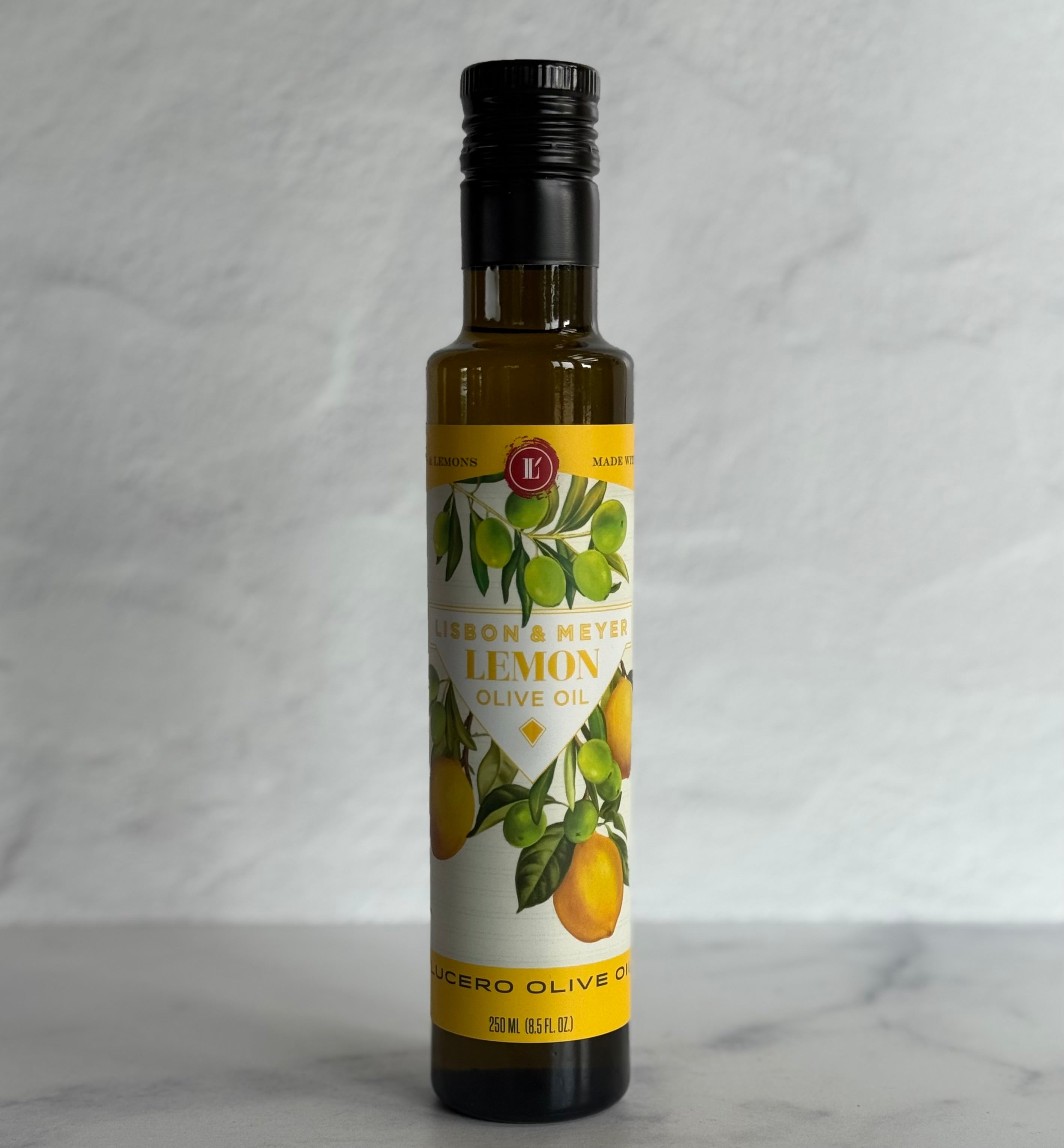 Bottle of Lemon Olive Oil with a label on a gray background