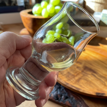Liz uses the same official tasting glasses employed by the Assagiatori Italiani Balsamico in Modena. Here she assesses the Bianco Balsamic Vinegar.