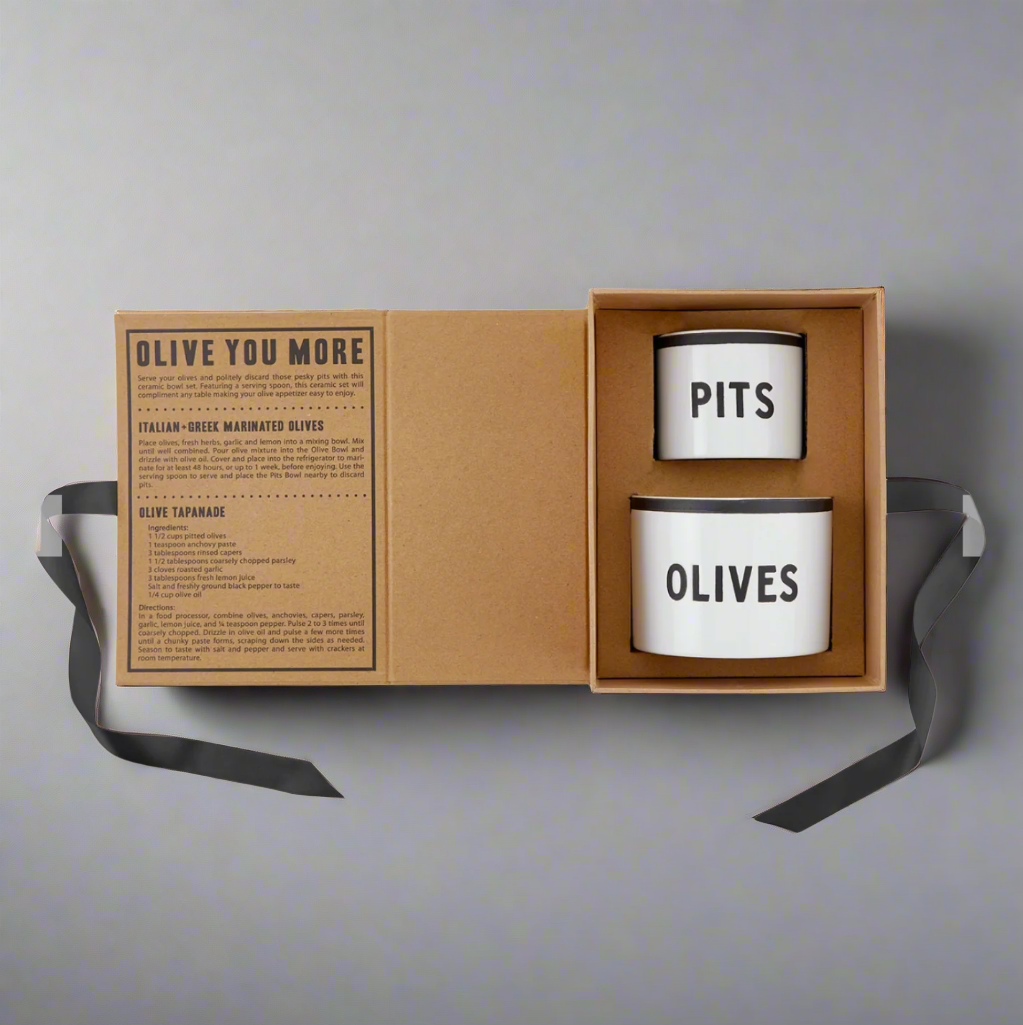 Book-shaped gift opens to reveal two recipes printed on the inside front cover and the two ceramic bowls suspended in a cardboard cut out.