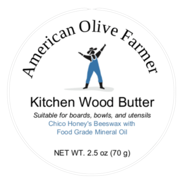 An image of the front label showing the American Olive Farmer logo and indicating Kitchen Wood Butter is suitable for boards, bowls, and utensils.