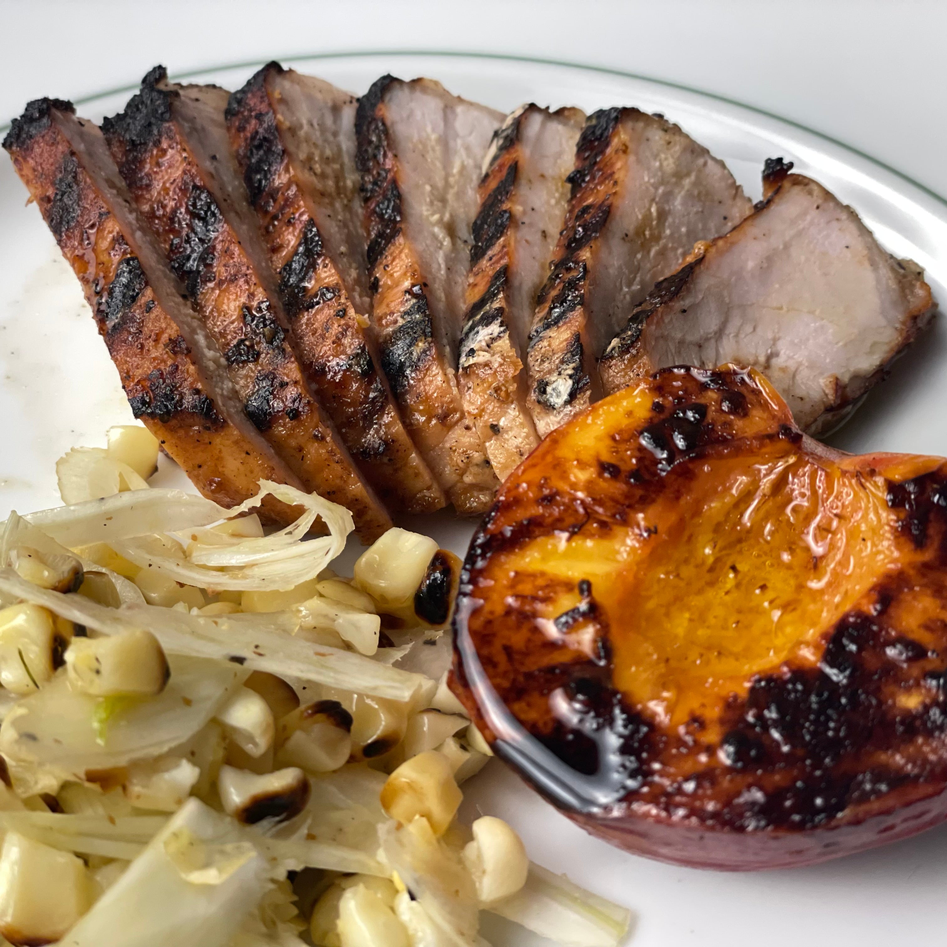 Smoky Brined Pork Chops with Peaches