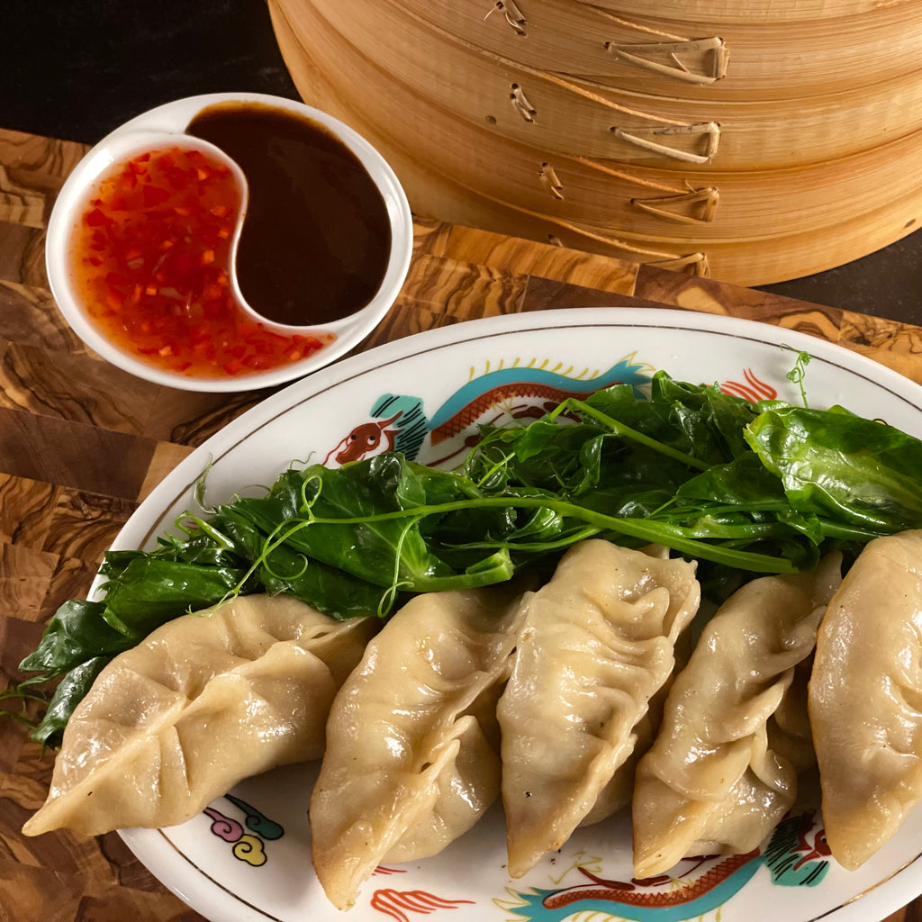 5 fried dumplings with pea sprouts. Served with choice of Firecracker sauce or Hoisin.