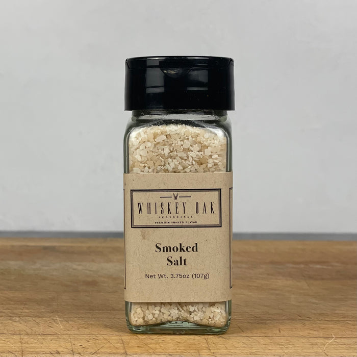 large salt crystals are shown in a spice jar with a label that indicates they're smoked.