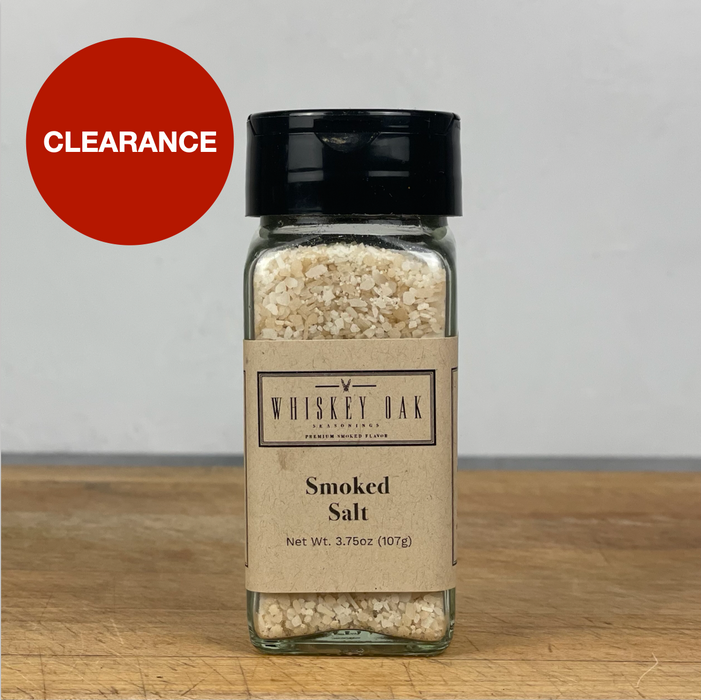 Close up image of the product, which is in a standard glass spice jar, on a wooden cutting board, and a big dot with the words CLEARANCE appears in the upper left corner