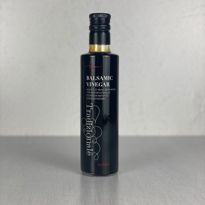 Bottle of Traditional Balsamic Vinegar on an empty counter