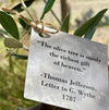 A close up of a gift tag with the Jefferson quote