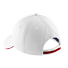 The white hat in shown from the back at an angle so you can see the velcro closure with red twill tape accent and part of the red accent in front.