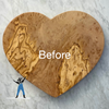 A heart shaped olivewood board is shown dry before conditioning with markings looking faded and the words BEFORE in white text in the center