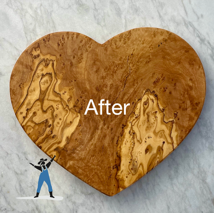 A heart shaped olivewood board is shown conditioned with rich markings and the words AFTER in white text over the center