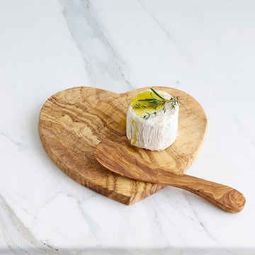 Heart Shaped Olivewood Board with Cheese, Olive Oil, and a sprig of fresh herbs