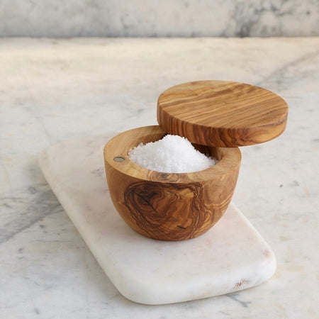 Beautiful modern olivewood salt cellar with hinged lid for easy access.